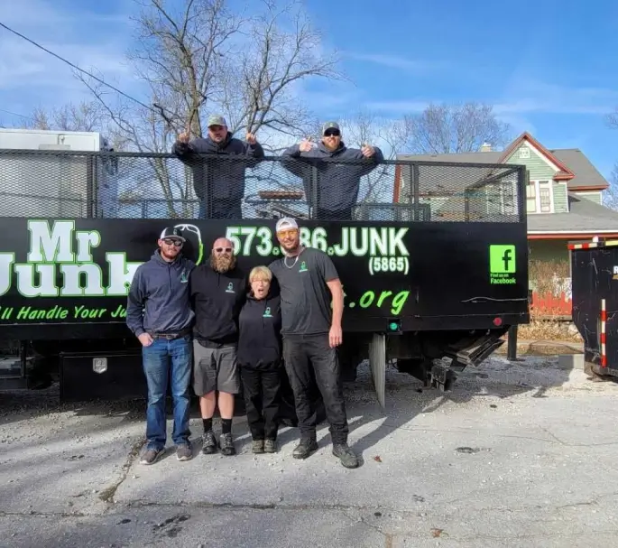 MrJunk® Crew standing with the lead crew for A&E Hoarders